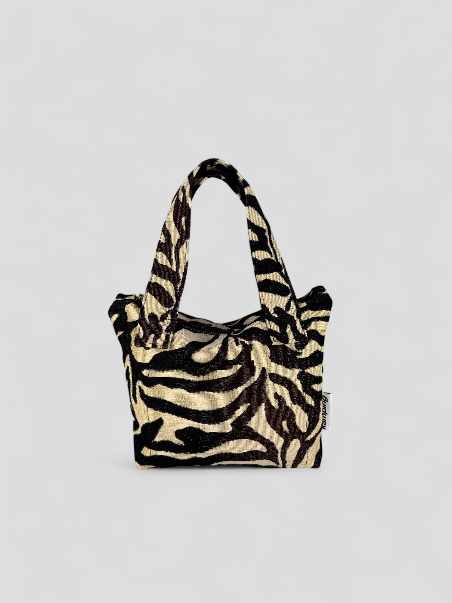 Kamping Studios kleine Umhängetasche mit Zebra-Muster, Produktfoto, Rückseite