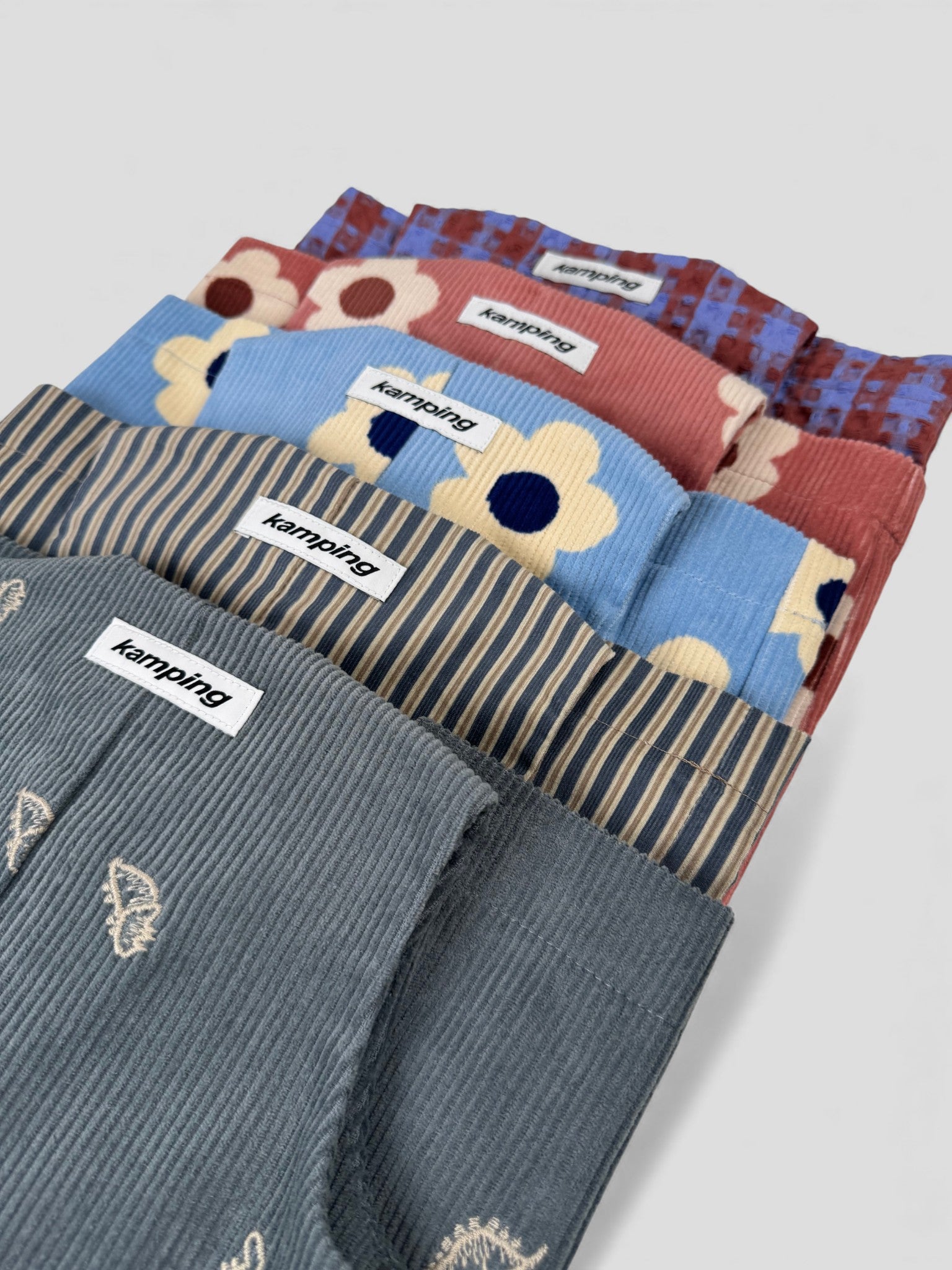 Baby Overall und Strampler von Kamping Studios, alle Farben