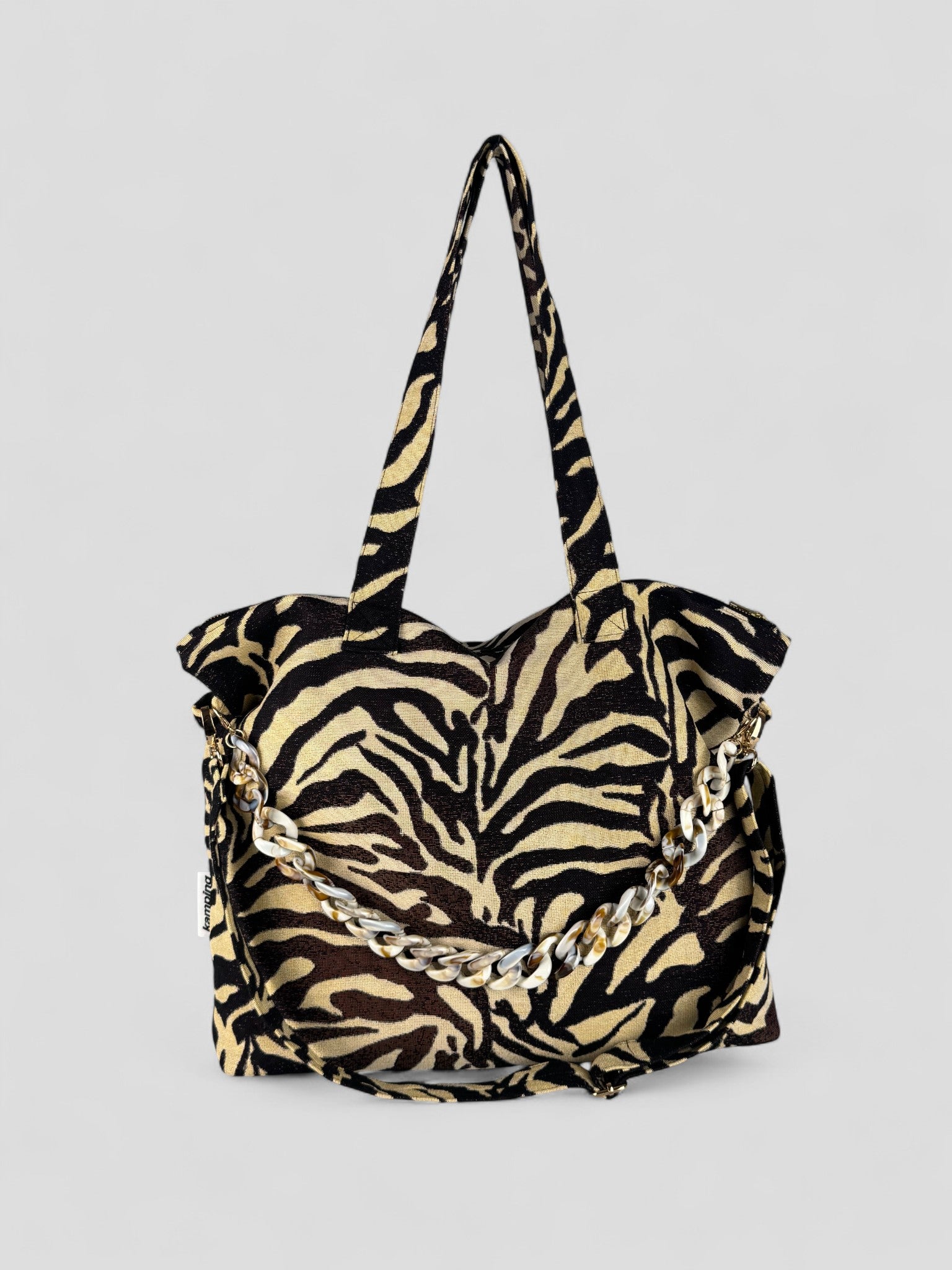 Kamping Studios Shopper zebra-muster, Produktfoto, Vorderansicht mit Kette und Gurt